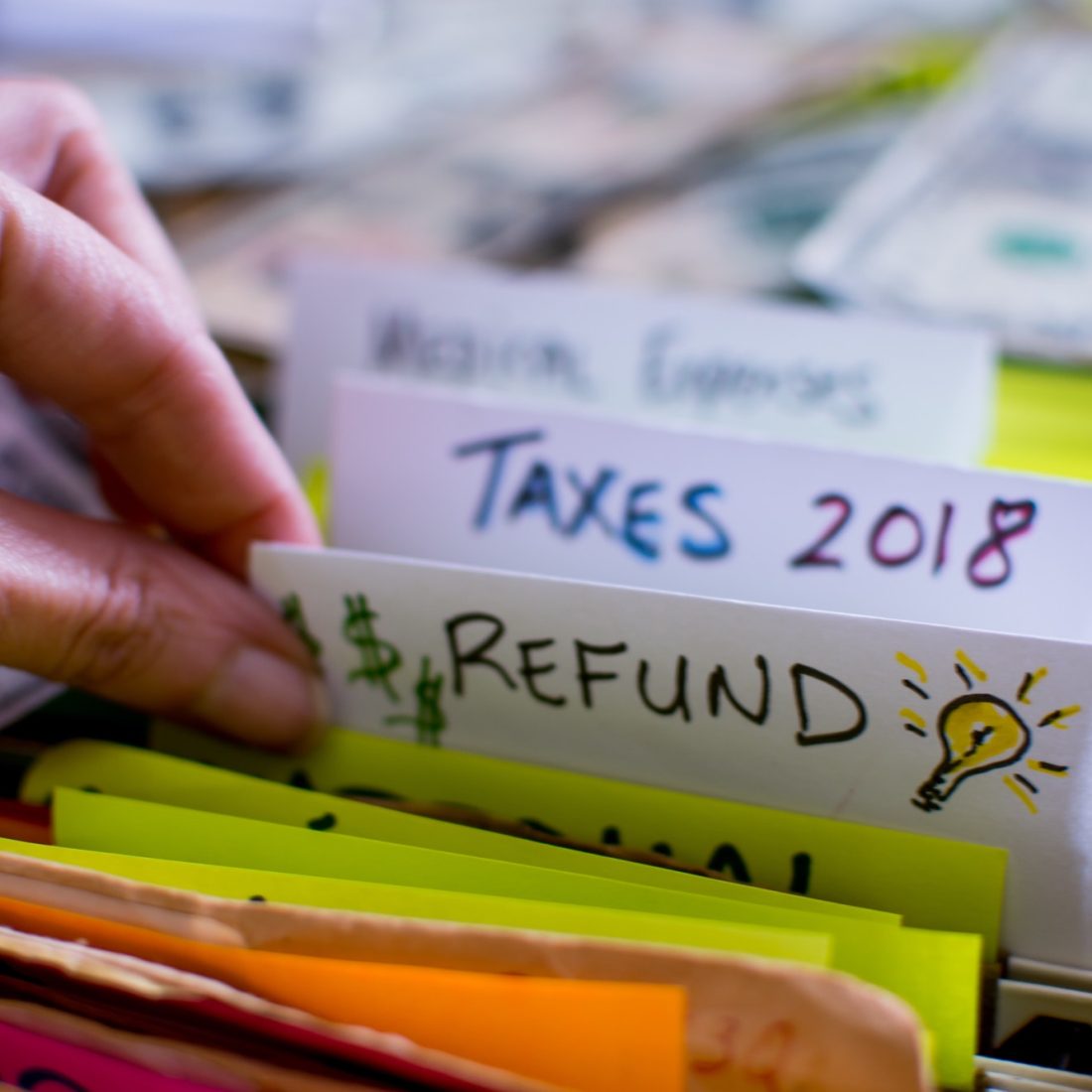 Preparing taxes 2018 tax refund ideas conceptual income tax return photography tax words and ideas